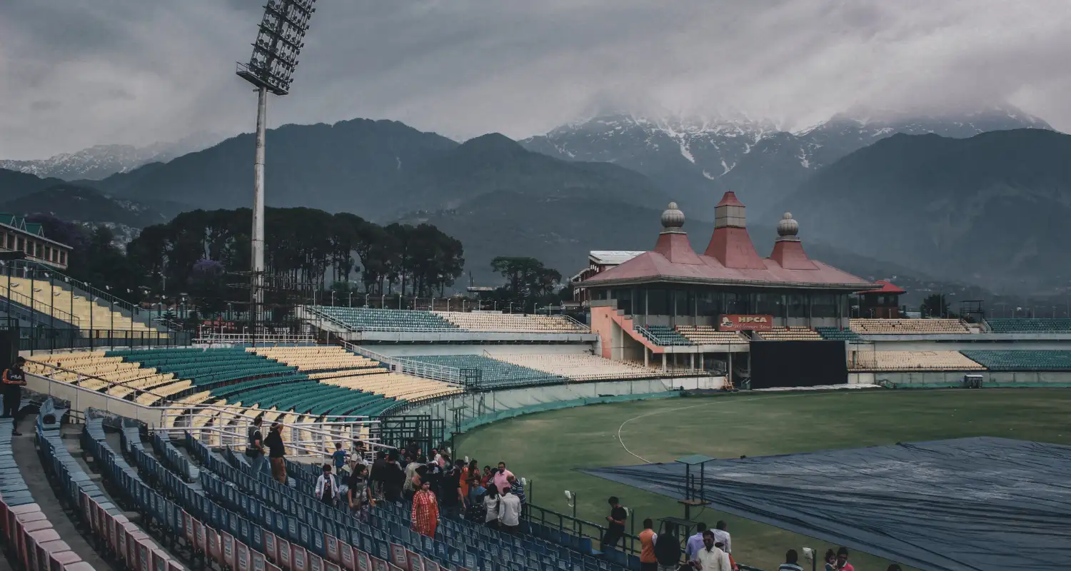 HPCA Cricket Stadium in Dharamshala with the snow-capped Dhauladhar range, a stop on the Dharamshala tour